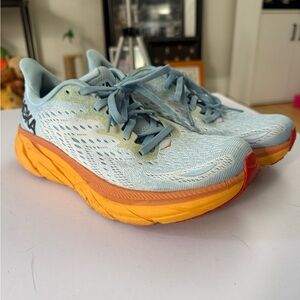 Hoka Clifton 8 Women's Light Blue Running Shoes with Orange & Yellow Sole